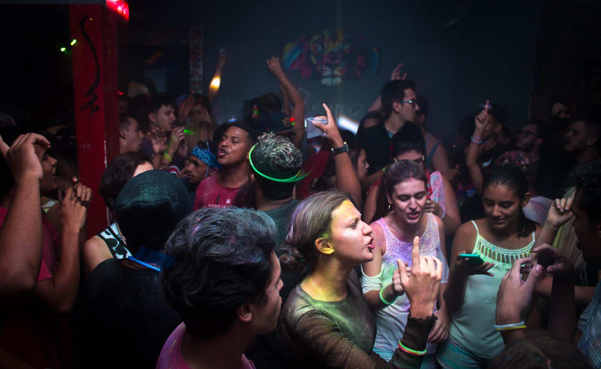 People in a club with glow bands