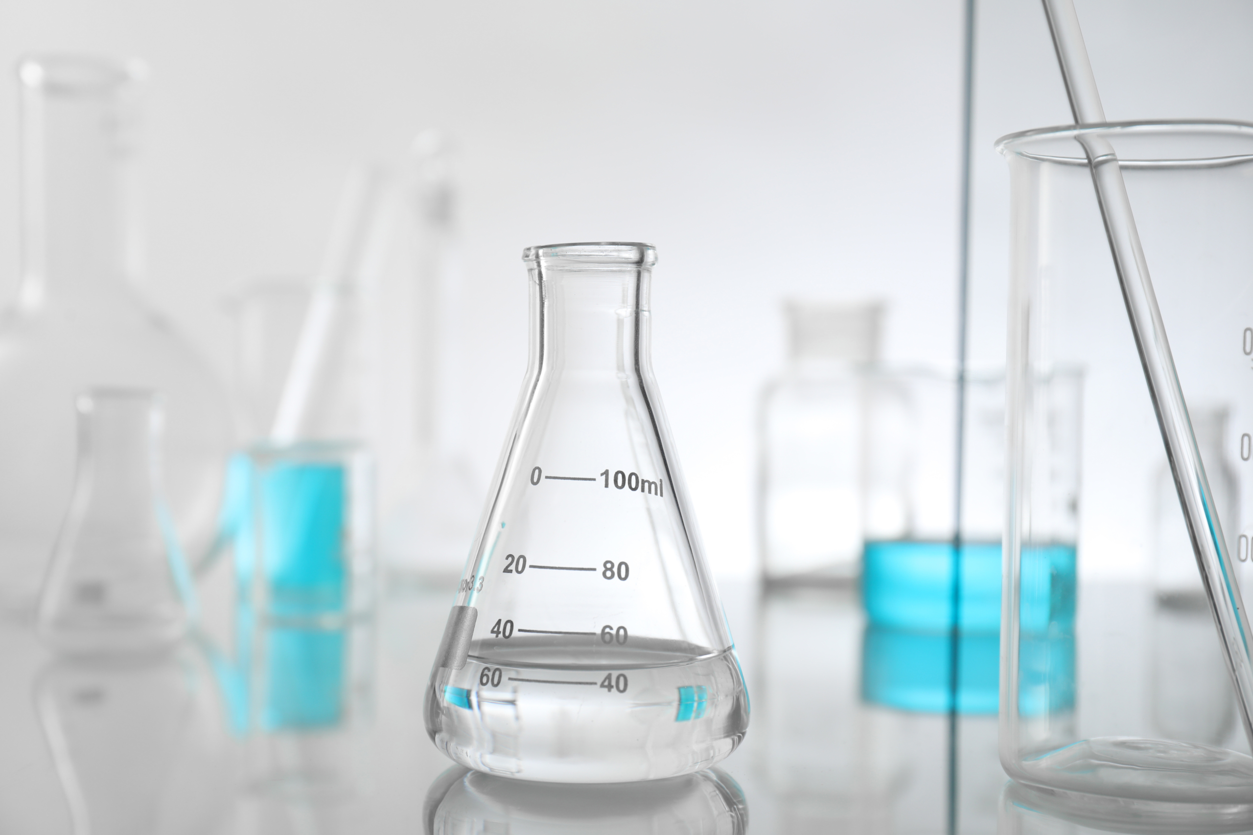 Beakers in a lab setting
