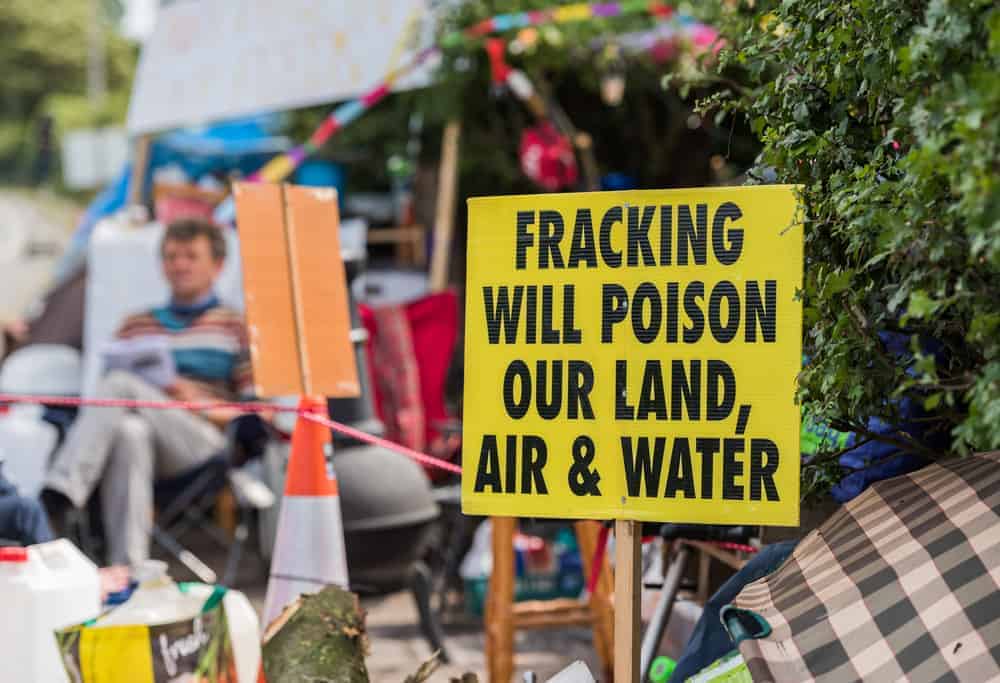 Fracking opponents protesting near fracking sites about the damage to health and the environment