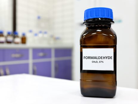 Formaldehyde in brown amber glass bottle inside a laboratory