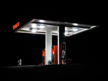 A shot of a Texaco petrol station at night time
