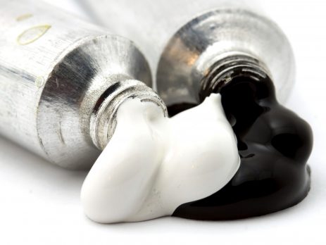 tubes of black and white paint