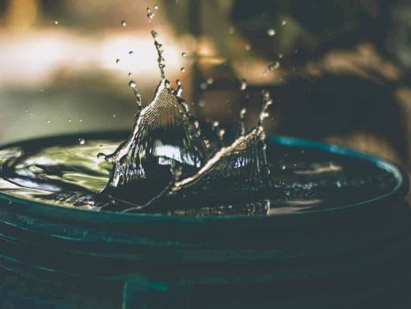 Droplet of water splashing in a barrel