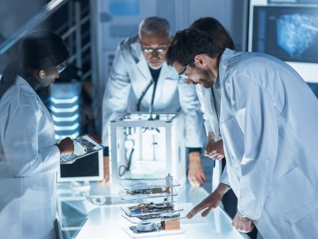 Scientists working out background calculations