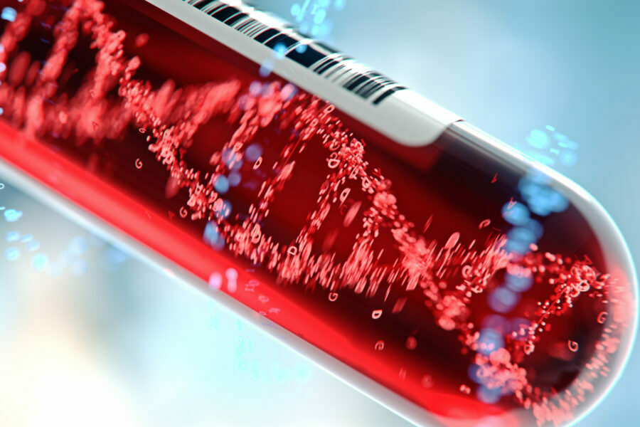 Conceptual image of a molecule of DNA forming inside a test tube containing blood