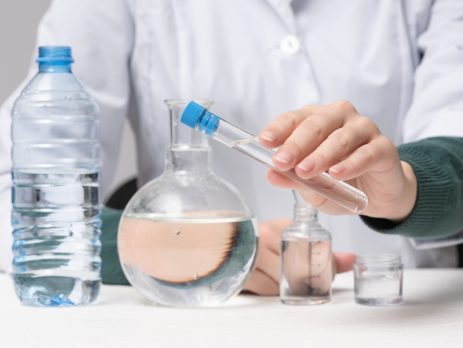 A scientist analysing and testing water
