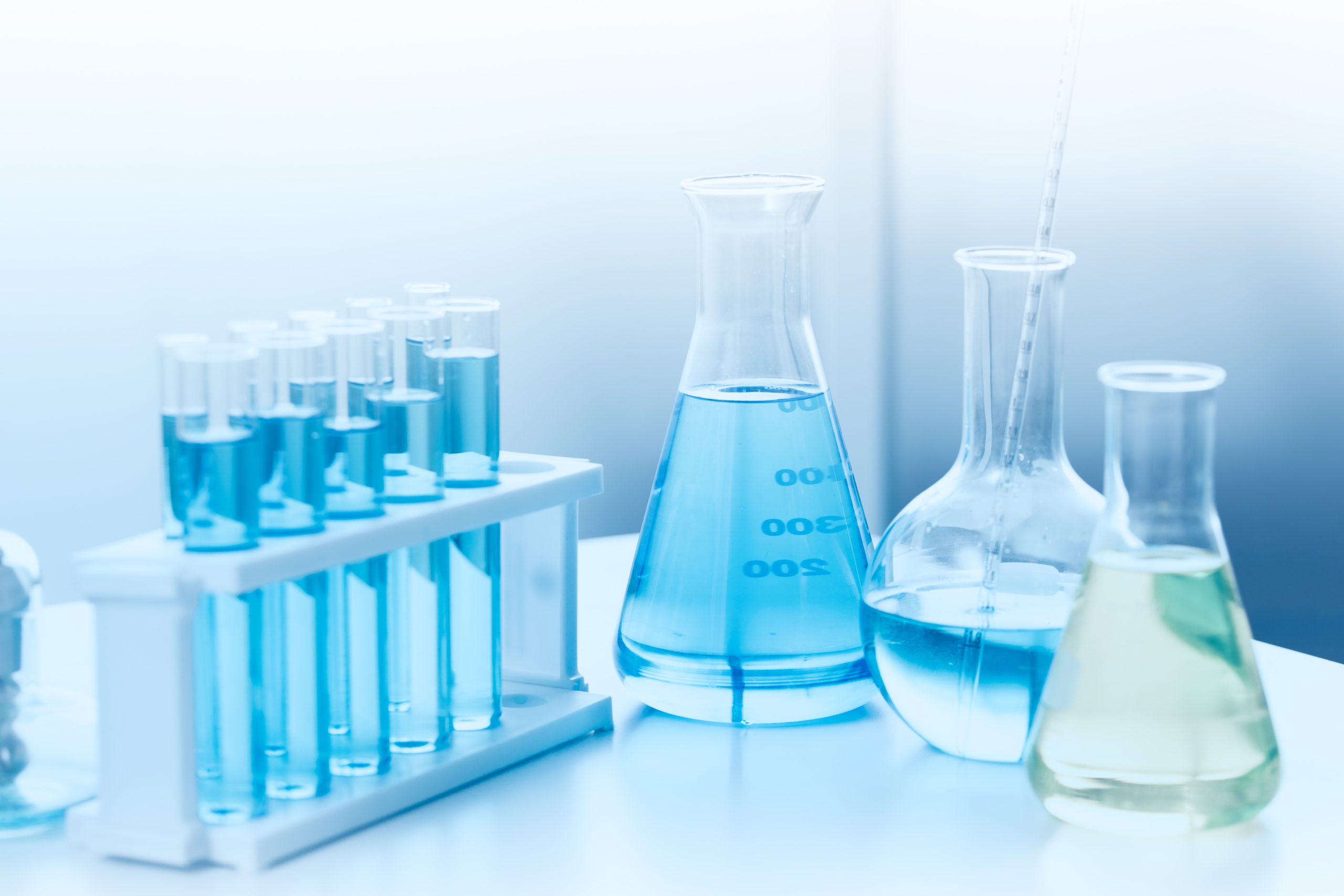 Beakers full of chemicals in a chemistry lab