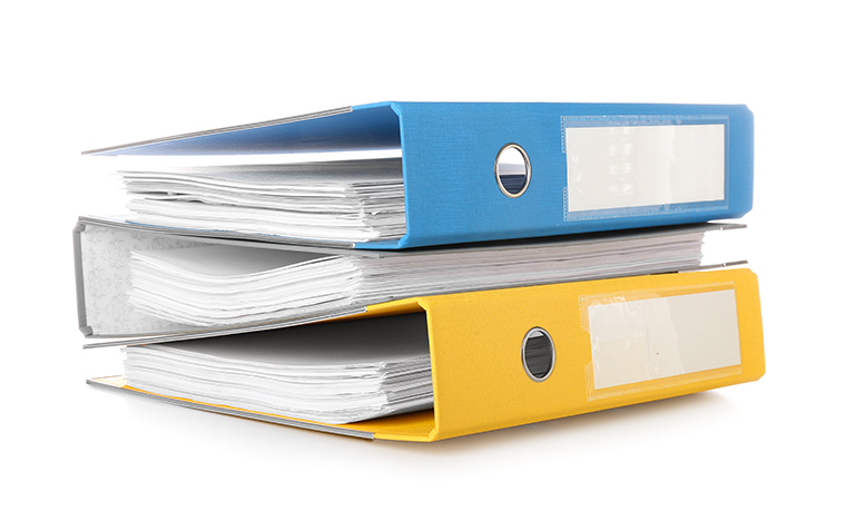 Pile of three office ringbinders on a white background