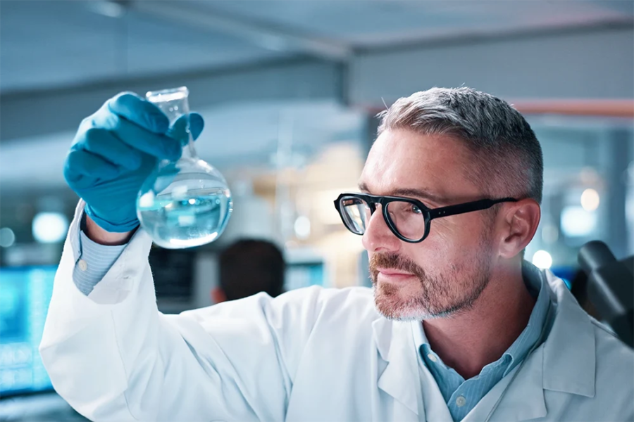 A scientist analysing and testing water