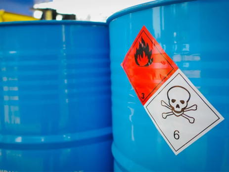 Flammable chemicals symbol on metal drums